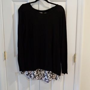 Black sweater with black and white floral under